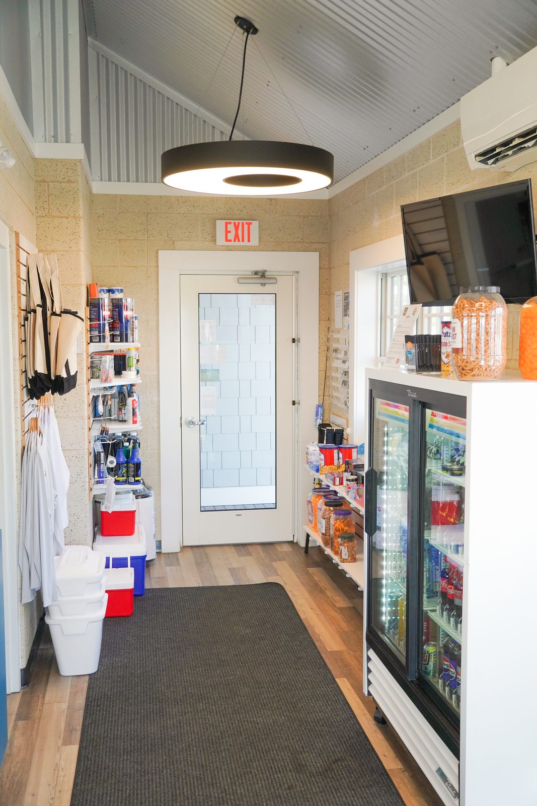 Inside the marina store, stocked with cold drinks, snacks, and boating supplies.
