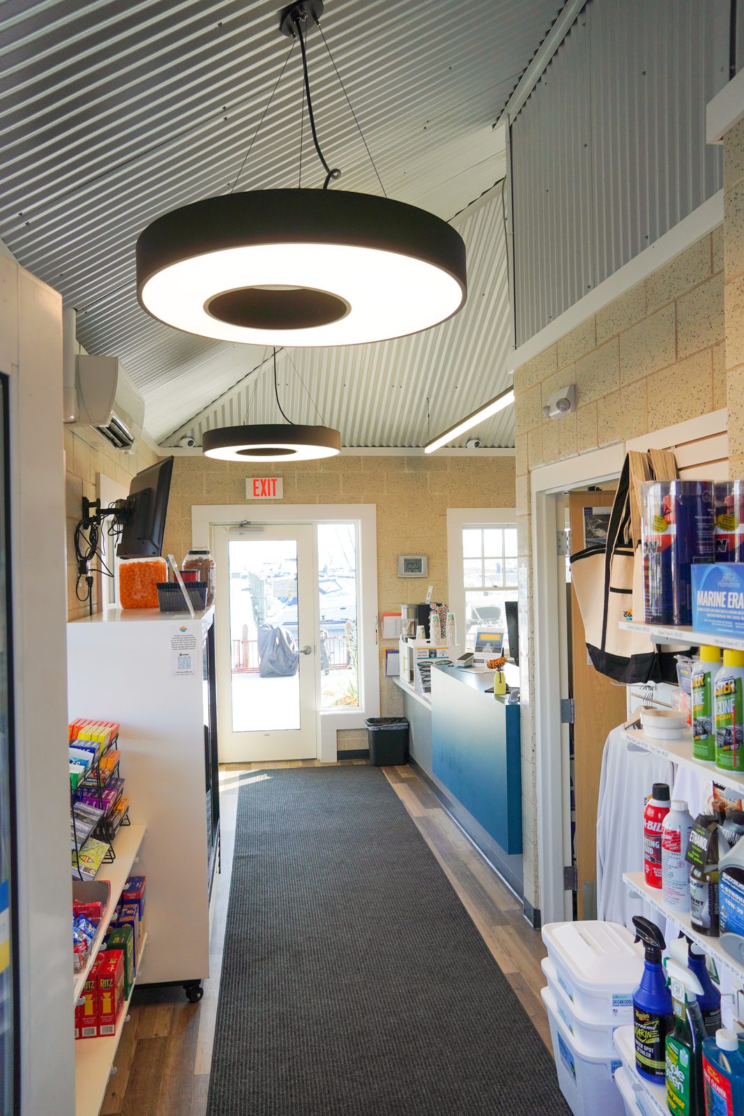 Inside the marina store with coolers of cold drinks, snacks, and boating essentials.